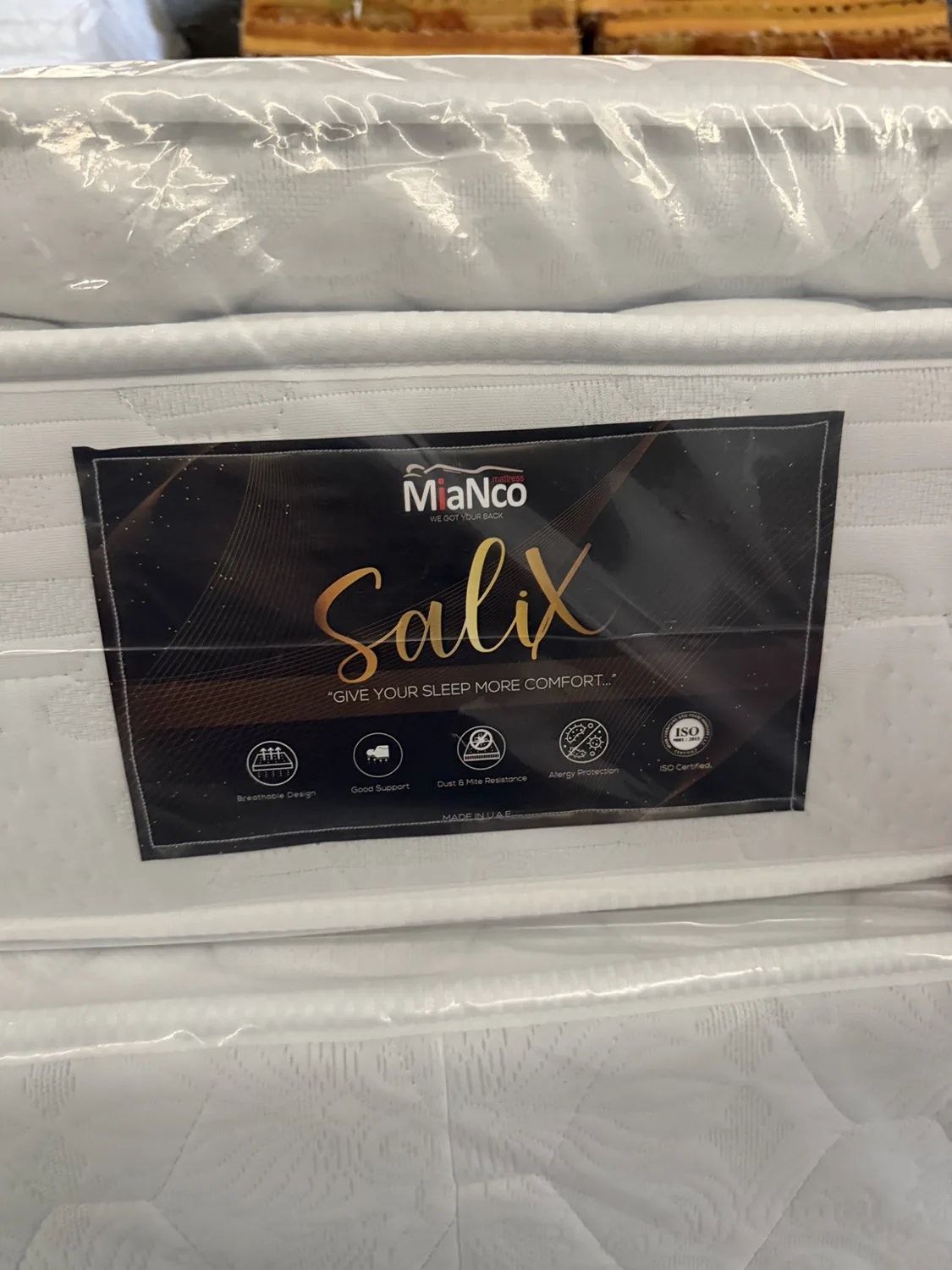 Plastic-wrapped mattress stock